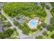 Community features a pool and playground, all nestled in a lush and verdant landscape at 1639 Balsam Willow Trl, Orlando, FL 32825