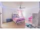Bright bedroom illuminated with LED strip lights, featuring a pink-themed decor and a cozy teepee at 1639 Balsam Willow Trl, Orlando, FL 32825