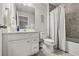 Neutral bathroom featuring a single sink vanity and a shower-tub combination at 16564 Silversaw Palm Dr, Winter Garden, FL 34787