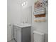 Clean and stylish bathroom featuring modern fixtures, a sleek vanity, and ample lighting for a refreshing experience at 2042 Education St, St Cloud, FL 34771