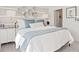 Comfortable bedroom with lamps and decorative touches, offering a relaxing retreat at 2042 Education St, St Cloud, FL 34771