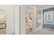 Bedroom peek featuring decor, white crib and chair at 2042 Education St, St Cloud, FL 34771