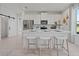 Modern kitchen features stainless steel appliances and a large center island with seating at 2042 Education St, St Cloud, FL 34771