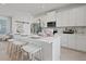 Modern kitchen features stainless steel appliances and a large center island with seating at 2042 Education St, St Cloud, FL 34771
