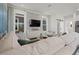 Cozy living room with comfortable seating, sleek entertainment center, and modern lighting at 2042 Education St, St Cloud, FL 34771