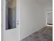 Covered brick patio area with access to the backyard and views of the home's exterior at 2042 Education St, St Cloud, FL 34771