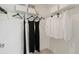 Organized walk-in closet with shelving and hanging space, offering ample storage solutions at 2042 Education St, St Cloud, FL 34771