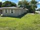 Attractive single-story home on a grassy corner lot with lush, mature trees at 2078 Keyes Ln, Deltona, FL 32738