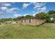 Single-story home with mature landscaping, and white window shutters at 2078 Keyes Ln, Deltona, FL 32738