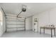 Garage with utility connections and door opener mechanism at 2078 Keyes Ln, Deltona, FL 32738