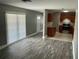 Bright open-concept living space leading to a modern kitchen, great for entertaining and everyday living at 2078 Keyes Ln, Deltona, FL 32738