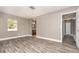 Spacious main bedroom with modern flooring and neutral paint at 2078 Keyes Ln, Deltona, FL 32738