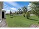 The backyard is large, green, and well-maintained, complete with a full-perimeter fence at 2354 Emerald Springs Dr, Apopka, FL 32712