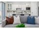 Bright, open kitchen with stainless appliances and white cabinetry, providing a modern look and feel at 2354 Emerald Springs Dr, Apopka, FL 32712