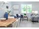 Bright, open living space features a dining area, and natural light creating a warm, inviting atmosphere at 2354 Emerald Springs Dr, Apopka, FL 32712