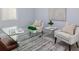 Bright office features clear desk and chairs with light walls and decor at 2354 Emerald Springs Dr, Apopka, FL 32712