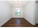Formal dining room with hardwood floors and natural light at 25974 High Hampton Cir, Sorrento, FL 32776