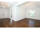 Dining room features hardwood floors and tray ceiling at 25974 High Hampton Cir, Sorrento, FL 32776