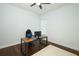 Home office featuring a modern desk, ergonomic chair, and neutral walls at 25974 High Hampton Cir, Sorrento, FL 32776