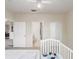 Bedroom showcasing multiple doorways, a ceiling fan and carpet flooring at 3428 Soho # 301, Orlando, FL 32811