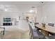 Open concept living area, open to the kitchen and dining area at 3428 Soho # 301, Orlando, FL 32811