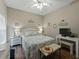 Cozy bedroom with a nautical theme, decorative accents, and a comfortable seating area at 3556 Sunset Isles Blvd., Kissimmee, FL 34746