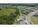 Areal view of a residential neighborhood highlighting the community's green spaces and suburban charm at 3759 Crimson Clover Dr, Mount Dora, FL 32757