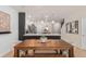 Open concept dining area with pendant lights and modern finishes at 389 Meadowland Pt, Oviedo, FL 32765