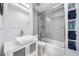 Modern bathroom featuring a tub-shower combo, stylish vanity, and sleek fixtures at 402 Saint Dunstan Way, Winter Park, FL 32792