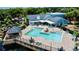 Aerial view of a community pool, hot tub, and patio area, perfect for relaxation and entertainment at 4606 Commander Dr # 1126, Orlando, FL 32822
