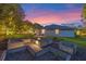Large backyard featuring modern raised garden beds and professional landscaping at 5102 Round Tree Ct, Orlando, FL 32819