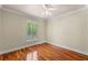 Bright bedroom with hardwood floors and natural light at 5102 Round Tree Ct, Orlando, FL 32819