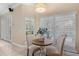 Charming breakfast nook with plantation shutters and views of the pool area at 5102 Round Tree Ct, Orlando, FL 32819