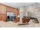 Spacious kitchen features stainless appliances, granite countertops, and ample cabinet space at 5102 Round Tree Ct, Orlando, FL 32819