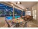 Outdoor patio with comfortable seating overlooking the pool at 5102 Round Tree Ct, Orlando, FL 32819