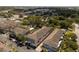 Aerial view showcasing townhomes in a landscaped community with parking at 528 Lanark Ct, Orlando, FL 32806