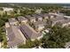 Townhome complex, set amongst manicured lawns with mature trees at 528 Lanark Ct, Orlando, FL 32806