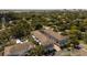 Overhead view of townhome community nestled among lush trees and landscaping at 528 Lanark Ct, Orlando, FL 32806