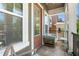 Charming balcony with outdoor seating, offering serene views and natural light at 528 Lanark Ct, Orlando, FL 32806