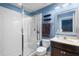 Fresh bathroom with white shower and blue walls, creating a clean and stylish space at 528 Lanark Ct, Orlando, FL 32806