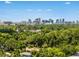 Stunning city skyline view amidst a lush green landscape and beautiful blue sky at 528 Lanark Ct, Orlando, FL 32806