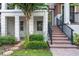 Charming front porch featuring a bistro set and an inviting front door at 528 Lanark Ct, Orlando, FL 32806