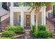 Cozy front porch with a seating area, perfect for relaxing outdoors at 528 Lanark Ct, Orlando, FL 32806