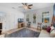 Bright living area with wooden floors, large windows, and stylish decor offers a welcoming atmosphere at 528 Lanark Ct, Orlando, FL 32806