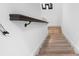 Elegant stairway with hardwood steps and white risers leading to the upper level of the home at 528 Lanark Ct, Orlando, FL 32806