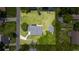 An overhead view of the residence, including the detached garage and a spacious backyard at 608 Cedar Ave, Holly Hill, FL 32117