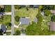 An overhead view of the residence, including the detached garage and a spacious backyard at 608 Cedar Ave, Holly Hill, FL 32117