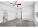 Bedroom with ceiling fan and attached bathroom at 6449 Sprucepine Ln, St Cloud, FL 34771