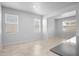 Bright living room features large windows and plenty of natural light at 6449 Sprucepine Ln, St Cloud, FL 34771