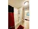 Bright bathroom with a tub, shower, and vanity with sink at 813 Marsh Reed Dr, Winter Garden, FL 34787